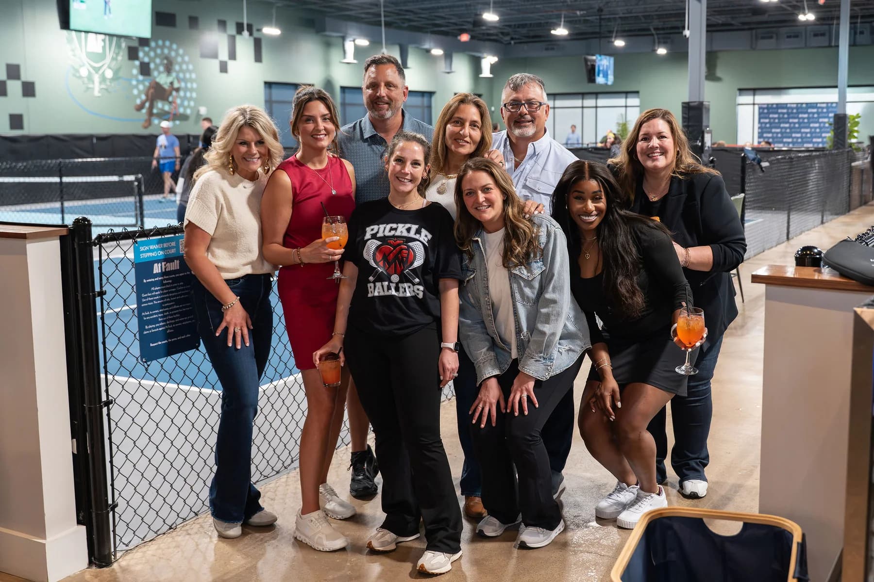 Group posing together at an At Fault private team event