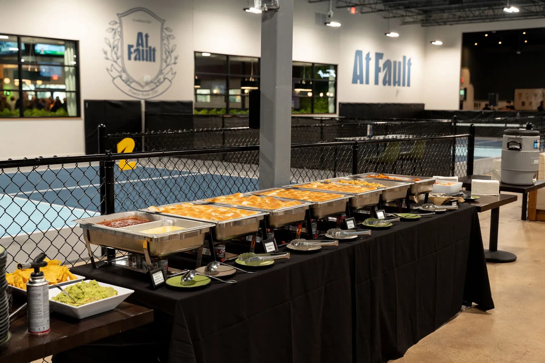 Chef John Franke catering buffet set beside the courts for a private event